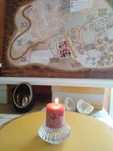 Rituel de purification du "tableau périodique" avec une bougie dans un cercle de protection